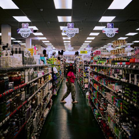 One real actual woman walking the aisles in pursuit of something