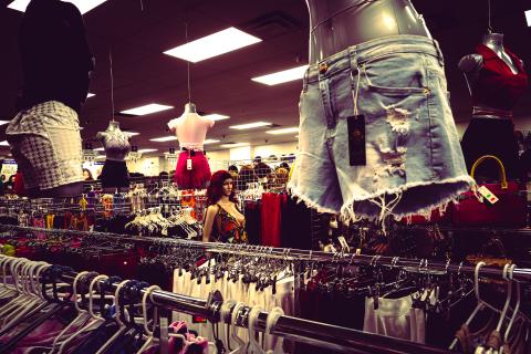 One human-like mannequin amongst it's half-bodied peers